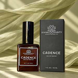 Cadence eau de parfum, 30 mL bottle and box against flowing Sage Linen fabric
