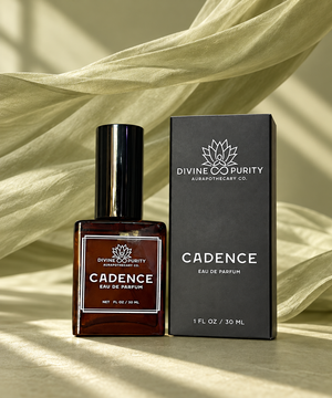 Cadence eau de parfum, 30 mL bottle and box against flowing Sage Linen fabric