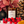 Divine Purity Cozy candle with red berries, burgundy leaves and a pinecone