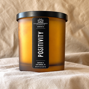 Positivity 8 oz candle in frosted amber glass